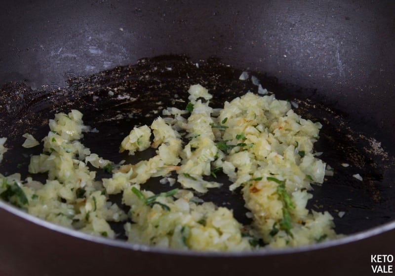 Cook onion garlic in bacon fat