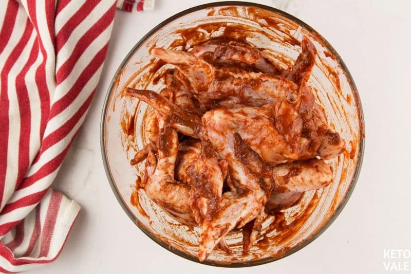 marinate wings with hot sauce