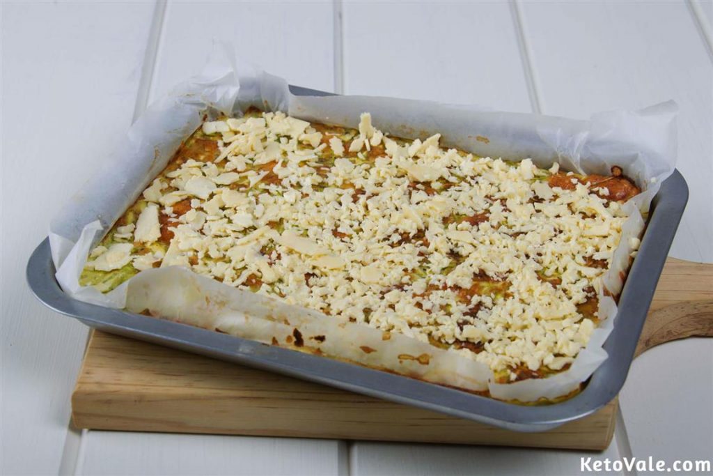 Topping with grated cheddar cheese