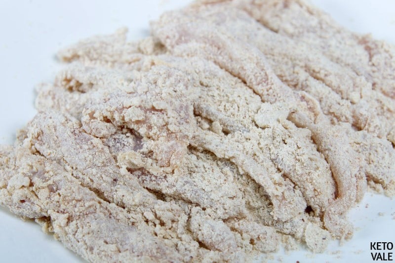 Coating chicken strips with almond flour