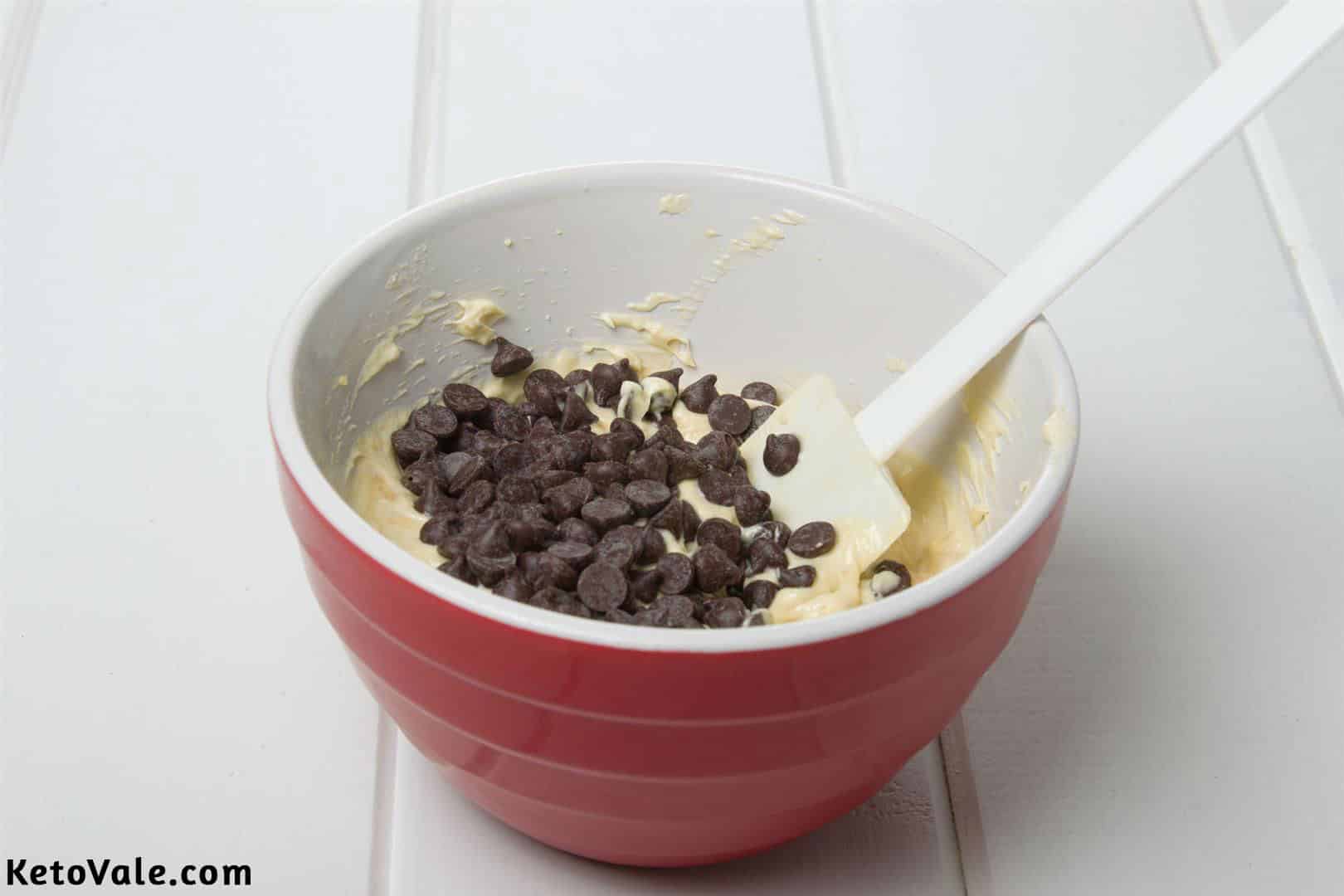 Adding chocolate chips