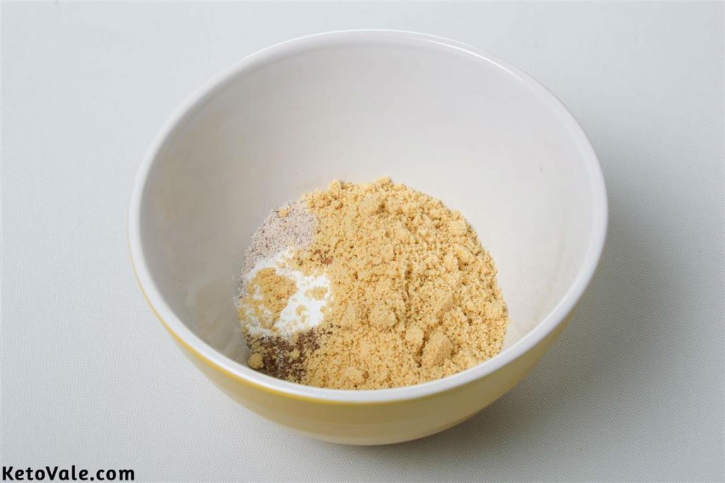 Mixing almond flour, flaxmeal, coconut flour
