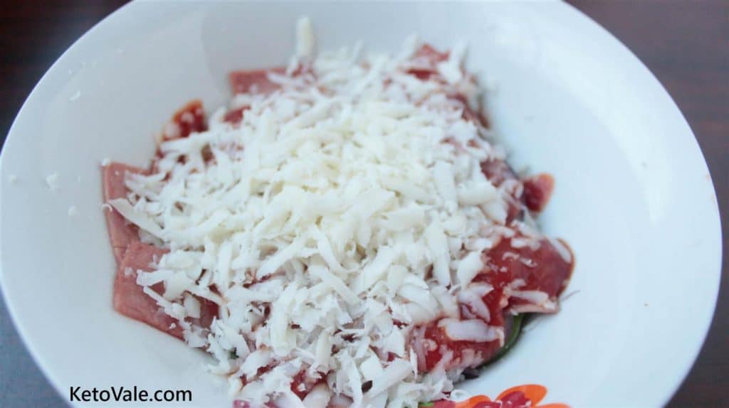 Sprinkle grated mozzarella cheese