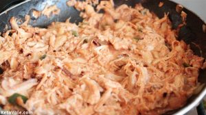 Cook shredded chicken with chili mix