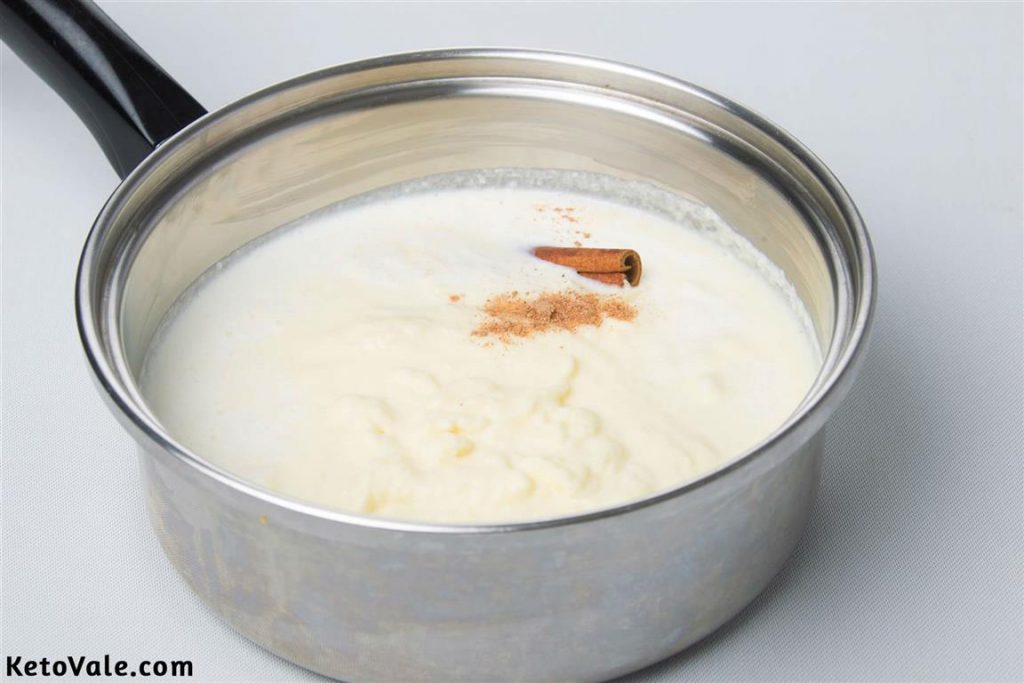Heat almond milk with heavy cream