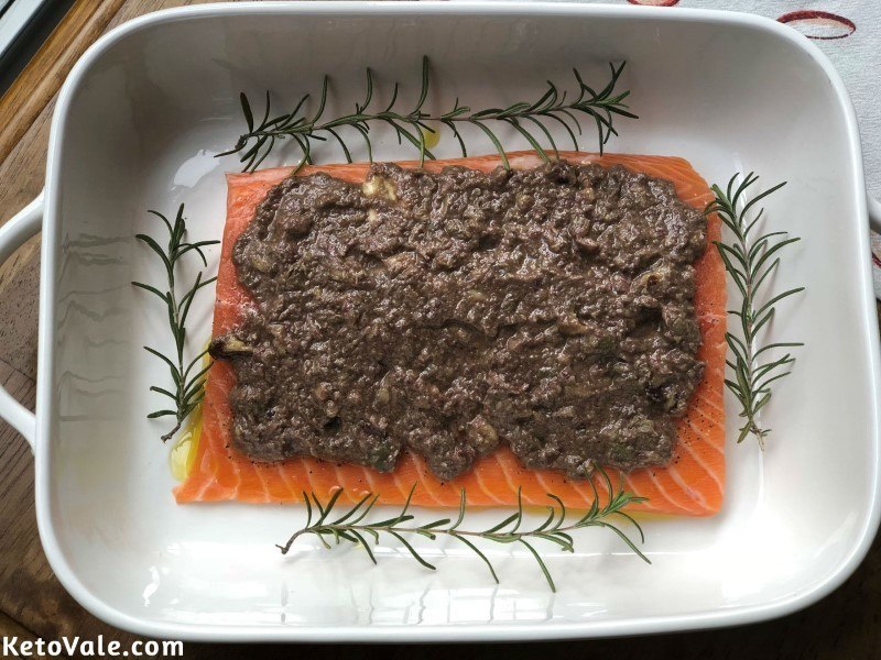 Pour tapenade over salmon