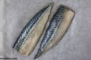 Season mackerel fillets with salt pepper oil