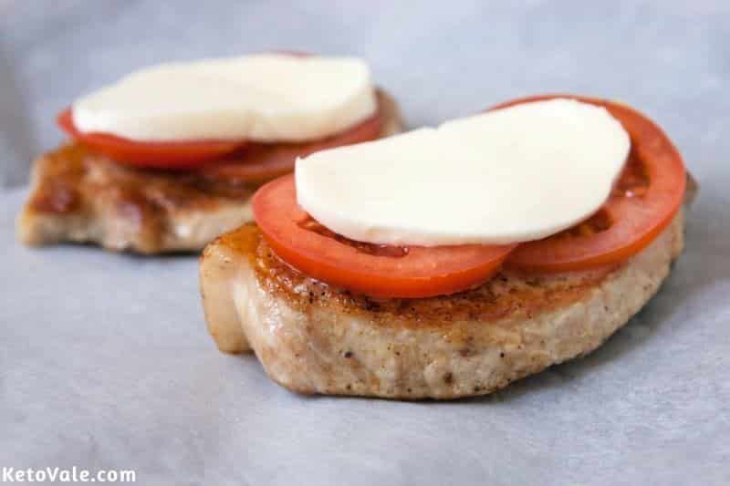 Top with tomato slices and cheese