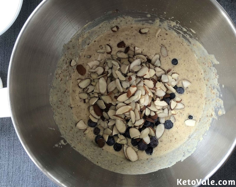 Fold in blueberries and shaved almonds