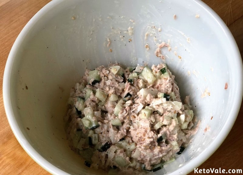 Mix tuna with mayo and cucumber