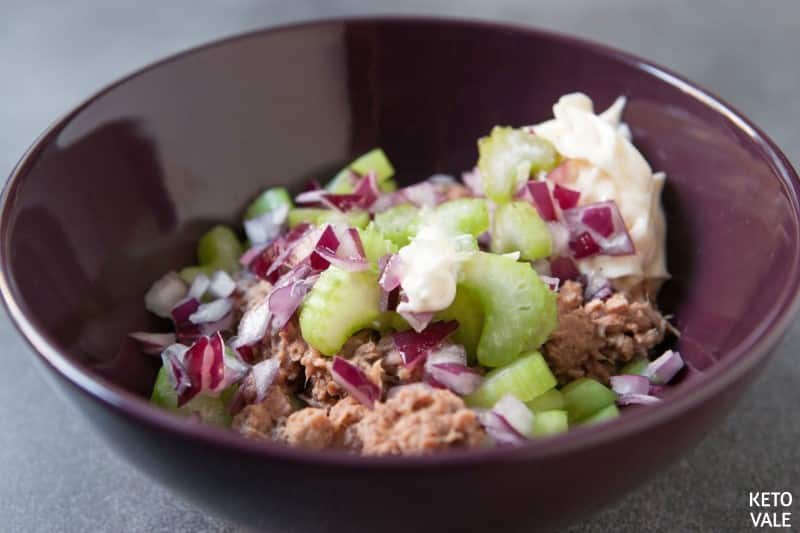 Mixing Tuna with vegetables