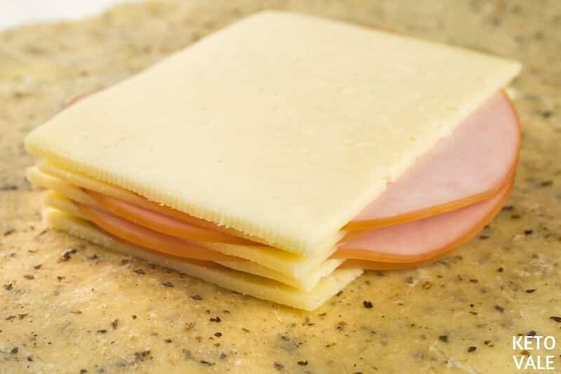 top with sliced ham