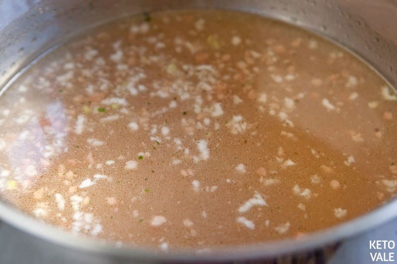 Adding cooked beef to broth