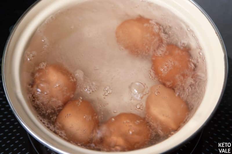 add salt and vinegar to boiling water