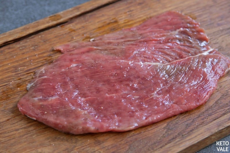 season sirloin steak with salt pepper