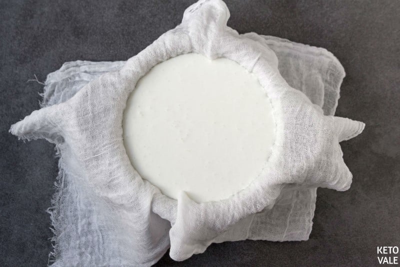 pour sour cream and yogurt in cheesecloth