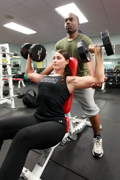 couple lifting weights