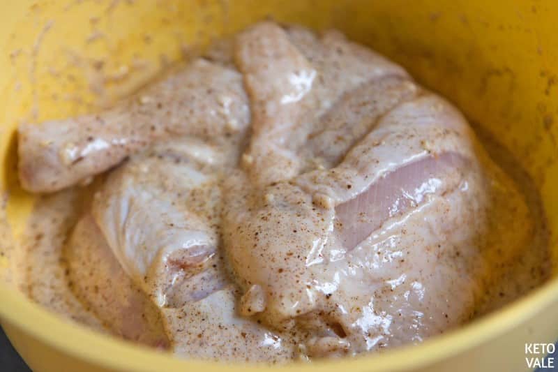 marinate chicken in spiced oil