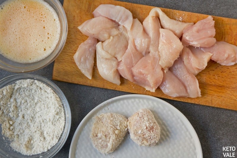 coat chicken in coconut mixture