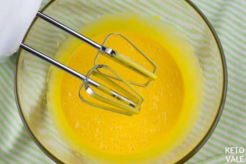  beat egg yolks with melted butter and vanilla