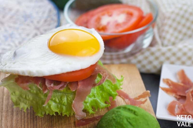 top with egg tomato