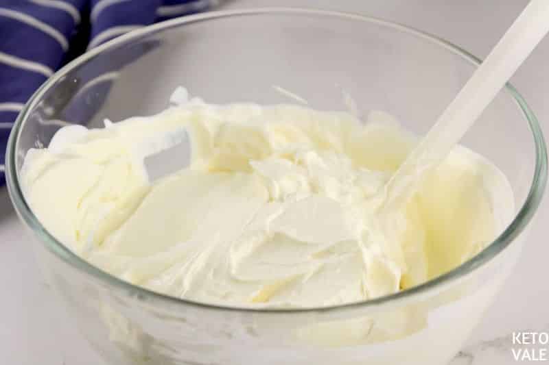combine cream cheese sweetener sour cream