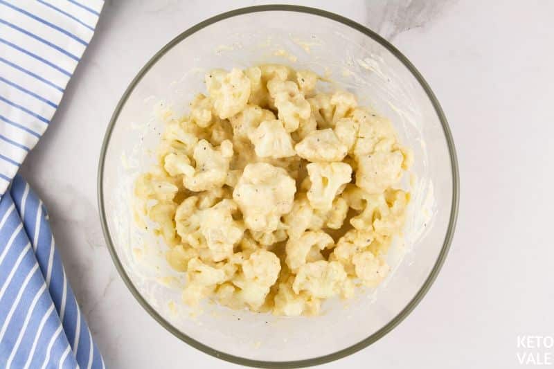 mix cauliflower with cheese sauce