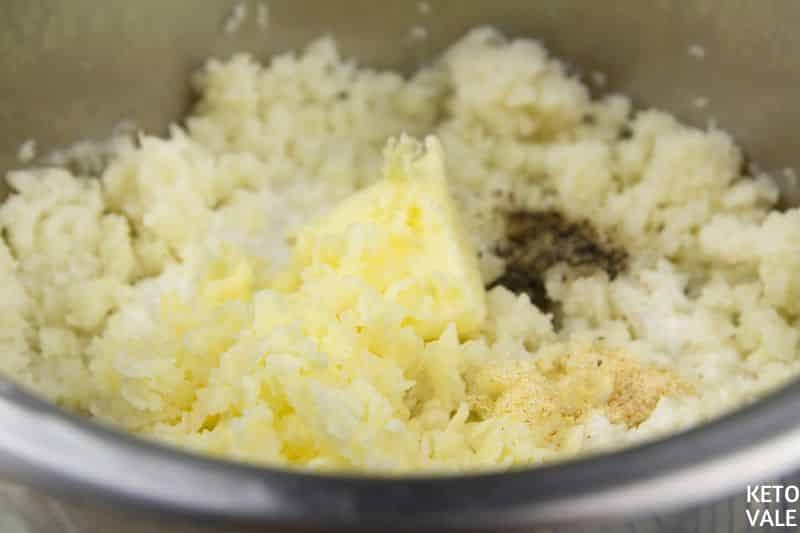 cook riced cauliflower butter cheese
