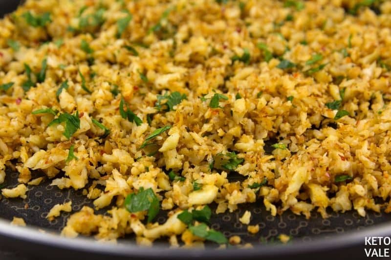 fry riced cauliflower until golden