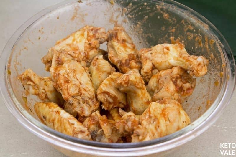 mix chicken wings with sauce