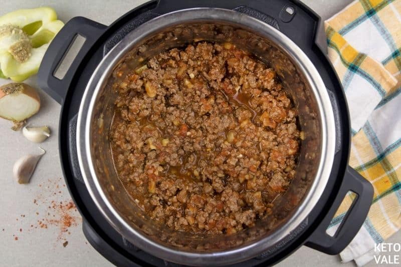 add sauce to ground beef