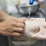 wash raw chicken
